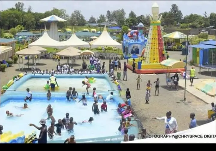 Families enjoying the pool and inflatables on a busy day at Vipe Fun Park