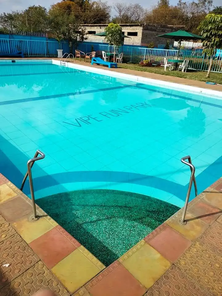 The shallow entry steps and handrails of the swimming pool at Vipe Fun Park